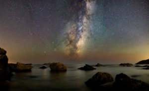 wide-field astrophotography shot of beach and space